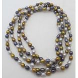 A 60" freshwater pearl necklace, individually knotted pearls, continuous flapper style length.
