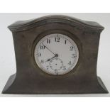 A small silver cased mantle clock, Birmingham 1924, approx 3 1/2" x 5". Condition report: Missing