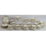 An antique continental porcelain part tea set comprising 13 plates, one bowl, 10 saucers and 20