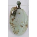 A Chinese celadon & russet carved jade snuff bottle of melon form with white metal spoon. Length 8.