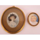 Two portrait miniatures on ivory, one of a child, the other of Mrs Siddons, label verso. Largest 9cm