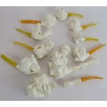 A collection of 10 Turkish Meerschaum Erotic Pipes, modelled in relief with various naked bodies