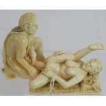 A Japanese Meiji period two-piece ivory erotic carving in the ancient Grecian taste, signed,