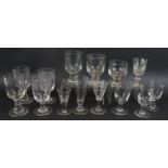 Fourteen mixed 19th century drinking glasses including various rummers, an ale glass, and an