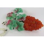 A mid 20th Century Murano glass grape and vine wall lamp with pink and green leaves and orange/