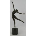 A bronze figure of a ballet dancer in the Art Deco style, mounted on a black marble plinth,