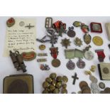 A collection of mainly WWII era medals, badges, coins and related items including Boy Scouts
