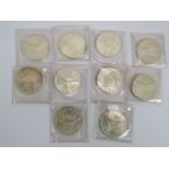 Ten 1965 Canadian silver dollar coins. Gross weight 230 grams. Condition report: All used.