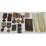 A WWI trio medal group engraved to 46.S Driver H Brooks R.M Brigade plus photo, discharge papers,