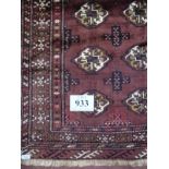 A Persian Turkman rug on brown ground. 1.48x1.05. Condition report: In good condition - slight