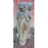 A nicely weathered reconstituted stone garden ornament in the form of three classical maidens.