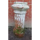 A large octagonal nicely weathered Victorian terracotta chimney pot, with relief latticework