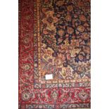 A fantastic (signed) Birjand carpet with a central eight point flower motif and depicting birds. 3.