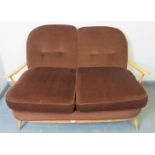 A mid-century Ercol Windsor 203 blond 2-seater sofa, with loose seat cushions in brown draylon.