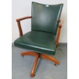 A vintage medium oak ?Hillcrest? desk chair, with tilt and swivel mechanism, on castors. Condition