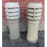 A pair of vintage industrial style terracotta chimney pots with vented cowels. Condition report: