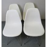 A set of four contemporary shell chairs in the manner of Eames, with polypropylene seats raised on
