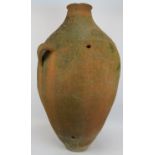 A large antique hand thrown amphora of some considerable age. Height 90cm. Condition report: One