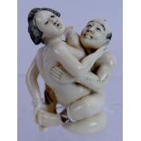 A Japanese Meiji period signed ivory erotic carving, depicting a couple copulating, height 4.5cm.