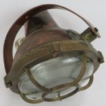 A vintage brass Miletich domed ship's lamp with later copper hanging bracket. Diameter 21cm.