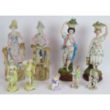 A pair of French Chantilly figurines, a similar pair of Bisque figurines, two smaller pairs and a