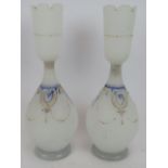 A pair of early 20th century Bohemian frosted glass vases with blue and gold decoration. Height