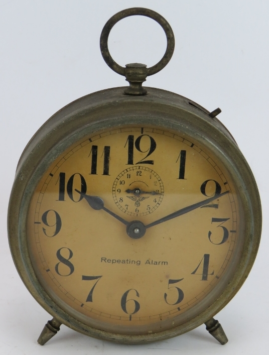 A WWII era FMS Mauthe alarm clock. Height 18cm. Condition report: Winds and ticks.