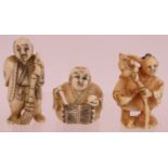 Three Meiji period Japanese carved ivory Netsuke figures depicting traditional characters. All