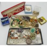 A large collection of mainly vintage jewellery to include a white metal brooch of a dragonfly with