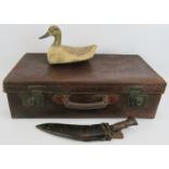 An early 20th century leather suitcase, a vintage hand painted decoy duck and an Indian Himalayan