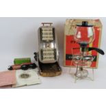 A 1950s super Actinea 59 portable sun lamp with accessories plus a vintage Pyrex coffee maker with