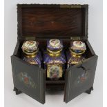 A 19th century French rosewood and boulle work tea caddy with three hand decorated porcelain jars.