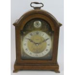 A Mappin & Webb walnut cased bracket clock with movement by Elliott. Height 25cm. Condition