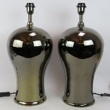 A large pair of contemporary polished smoked chrome table lamps of baluster form. Height 55cm. (pr).