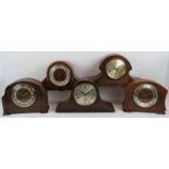 Five vintage striking and chiming mantle clocks, three in Napoleon shaped cases. Two missing