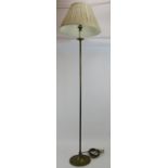 A vintage brass standard lamp of slim proportions with pleated cream shade. Height 140cm.