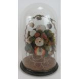 A Victorian wax fruit display under a period glass dome. Height 41cm. Diameter 24cm. Condition