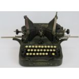 A 1913 Oliver No 9 typewriter in green finish with canvas cover. Condition report: Not tested.