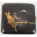 A Japanese Komai Seibie inlaid cigarette case depicting a Mount Fuji landscape scene. Signed to