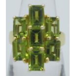 Peridot ring, 20mm x 15mm setting, faceted octagon cut stones, size P. 14k yellow gold/925. Good