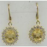 Citrine earrings, large 16mm x 13mm portrait setting, lever back, 14k/925. Good cut, clarity and