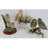 A Border Fine Arts figure of three tawny owls by Russell Willis plus two similar Country Arts