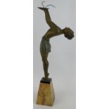 A French Art Deco semi nude figure lamp base of a female holding a ball shade (missing), mounted