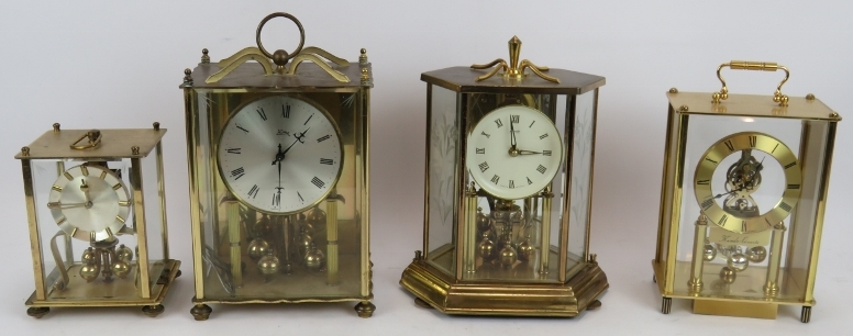 Three West German Kundo 400 day clocks plus a similar Koma clock. Tallest 28cm. (4). Condition