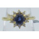 Brilliant round faceted tanzanite portrait set ring, size O. Platinum over sterling silver, good