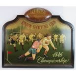 A reproduction 1846 rugby championship sign, hand painted with relief moulded players to centre.