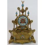 A late 19th century French gilt-metal cased striking mantle clock in the Islamic taste with blue en