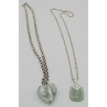 A jade pendant on a 925 stamped chain, a Murano heart shaped glass pendant on a white metal linked