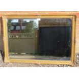 A period style bevelled rectangular wall mirror in moulded gilt gesso frame. Condition report: No