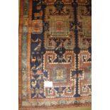 A BIDJAR KELLEH rug with central repeat/reverse pattern motif and depicting stylised animals. 3.30 x